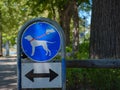 sign in park that means walking dog only on leash. Royalty Free Stock Photo