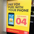 A sign ` pay for fuel with your phone`