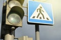 Sign pedestrian crossing and traffic lights on sky background, the concept of road safety Royalty Free Stock Photo