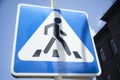 Sign pedestrian crossing and traffic lights on sky background, the concept of road safety, Royalty Free Stock Photo