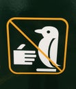 Sign of penguin crossing do not touch