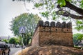 A sign for people crossing the road with a Chiang Mai moat. Royalty Free Stock Photo