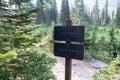 Sign for the pit toilet along the Iceberg Lake trail in Glacier National Park Royalty Free Stock Photo