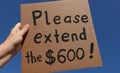 Sign pleading for extension of $600 benefits