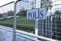 Sign police in Turkish language on metallic borders barricades Royalty Free Stock Photo