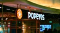 Warsaw, Poland. 5 December 2023. Sign Popeyes. Company signboard Popeyes.