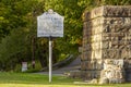 A sign post showing the location of the ruins of historic Ellicott Mills