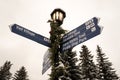 A sign post in Vail, Colorado during winter.