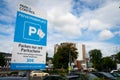 Sign of a private parking surveillance company in front of a train station Royalty Free Stock Photo