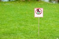 Sign prohibited to walk at grass lawn Royalty Free Stock Photo