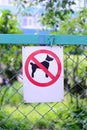 Sign prohibiting dog walking, no dogs sing vertical location Royalty Free Stock Photo