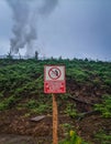 A sign prohibiting littering around the company. Indonesian Moluccas