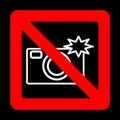 Sign prohibiting use of camera.