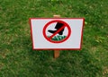 A sign prohibiting walking on the lawn Royalty Free Stock Photo