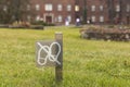 Sign prohibiting walking on the lawn close-up Royalty Free Stock Photo
