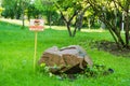 Sign prohibiting walking on the lawns in the park. Sign on the lawns do not walk on the lawn. Not to walk on the lawns in Russian Royalty Free Stock Photo