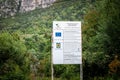Sign promoting a reconstruction project funded by the European Union in Romania.