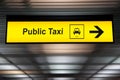 Sign public taxi with arrow to direction for passenger