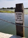 No crabbing or fishing sign on jetty.