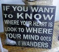 St. George, Bermuda - August 14, 2014: Sign with Quote by Vi Keeland: If you want to know where your heart is, look where your min