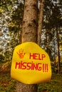 A sign reading help missing