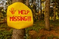A sign reading help missing