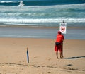 A sign reads beach closed.