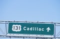 A sign that reads Ã¯Â¿Â½131 CadillacÃ¯Â¿Â½