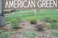 A sign that reads Ã¯Â¿Â½American GreenÃ¯Â¿Â½ Royalty Free Stock Photo