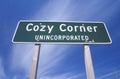 A sign that reads Ã¯Â¿Â½Cozy Corner UnincorporatedÃ¯Â¿Â½