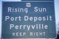 A sign that reads Ã¯Â¿Â½Rising Sun Port Dempsey Perryville Keep RightÃ¯Â¿Â½