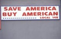 A sign that reads Ã¯Â¿Â½Save America Buy AmericanÃ¯Â¿Â½