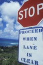 A sign that reads Ã¯Â¿Â½Stop - proceed when lane is clearÃ¯Â¿Â½