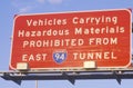 A sign that reads Ã¯Â¿Â½Vehicles carrying hazardous materials prohibitedÃ¯Â¿Â½ Royalty Free Stock Photo