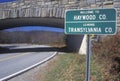 A sign that reads Ã¯Â¿Â½Welcome to Haywood Co.; Leaving Transylvania Co.Ã¯Â¿Â½