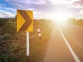 Sign beside the road for warning sharp curves.