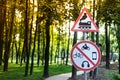 Sign of the rules of the road. Road sign Riding train, traffic is prohibited for bicycles and motor vehicles. Railway crossing. Royalty Free Stock Photo