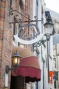 Sign saying Hotel in a Bruges street