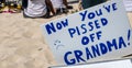 A sign saying ` now you pissed off grandma` at a protest