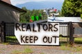 Sign saying `Realtors Keep Out` on the gate outside of a private property. Royalty Free Stock Photo