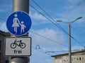 Sign saying sidewalk for pedestrians, bikes allowed`` Royalty Free Stock Photo