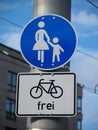 Sign saying sidewalk for pedestrians, bikes allowed`` Royalty Free Stock Photo