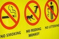 Sign that says no smoking no feeding monkeys no littering