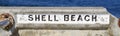 A sign that says Shell Beach