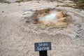 Sign for the Shell Spring, a bubbling hot spring geyser in Biscuit Basin, a thermal feature area of Yellowstone National Park Royalty Free Stock Photo