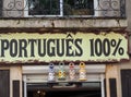 Sign at a shop in Portugal - Portugues 100