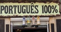 Sign at a shop in Portugal - Portugues 100