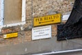 A sign showing the direction of the Rialto Bridge in the confusing, narrow streets of Venice, Italy Royalty Free Stock Photo