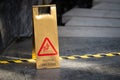 Sign showing warning of caution wet floor near wet area Royalty Free Stock Photo