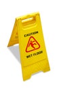 Sign showing warning of wet floor on white background, ,included clipping path Royalty Free Stock Photo